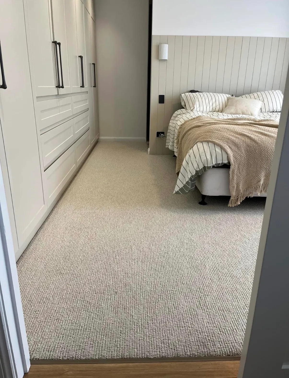 Newly installed carpet in a light filled bedroom